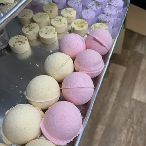 Handmade bath bombs in soft pink and cream